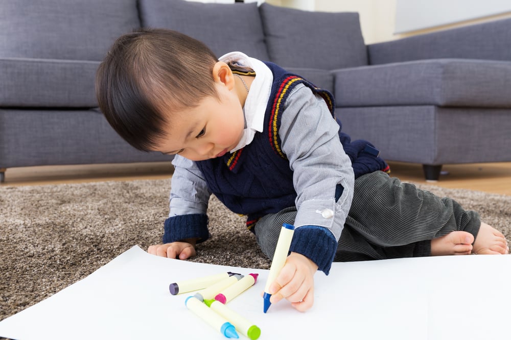 Asian baby kid drawing at home