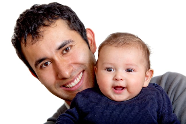 Happy man and baby boy isolated over a white background